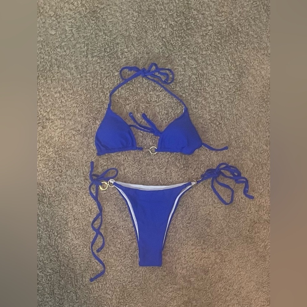 Vibrant Blue Bikini Set
New in bag 
Size Small